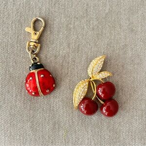 Joan’s River Cherry Brooch Pin with Red Enamel Cherries and Ladybug purse charm